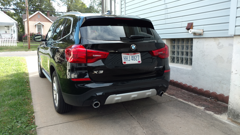 Notice the soot on the right exhaust tip and none on the left.